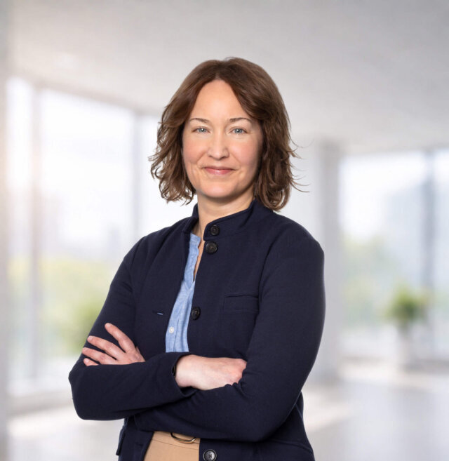 Photograph with windowed background of Bridget Bennett financial officer at law firm
