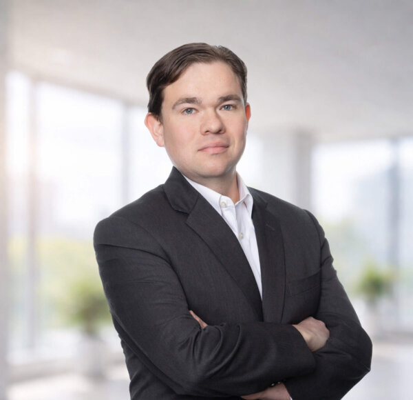 Photograph of Hunter Benson real estate corporate business attorney and partner in law firm